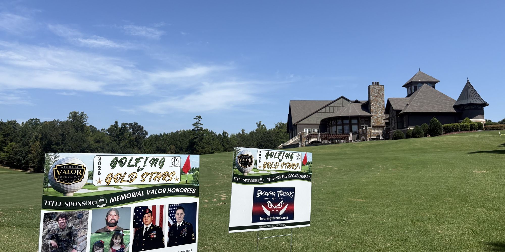Honoree signs on the course below the Palisades clubhouse