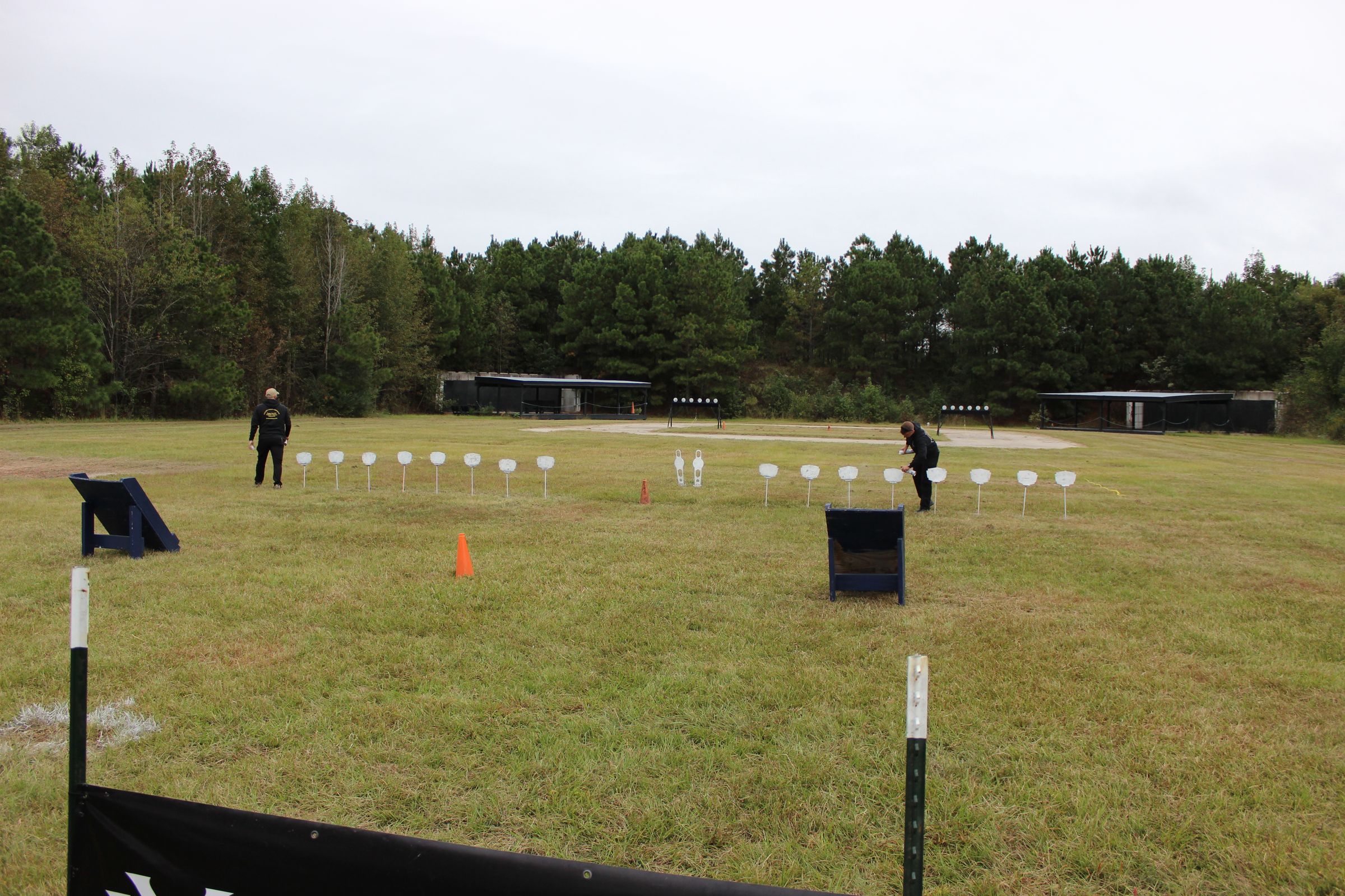 Competitors engage steel targets on a Memorial 3 Gun stage