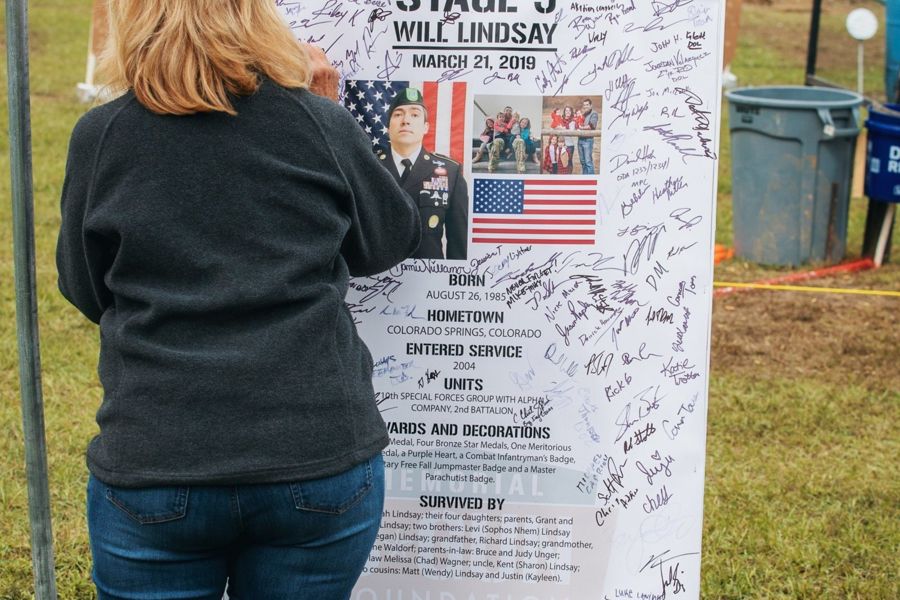 A moment at the signed Stage 5 sign for SFC Will D. Lindsay at the 2021 Memorial 3 Gun